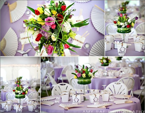 Wedding reception tables with floral centerpieces and fans
