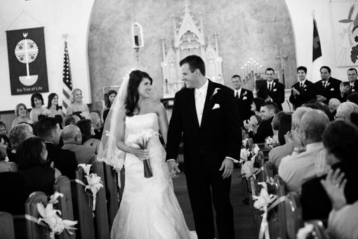 Black and white photo of bride and groom at wedding