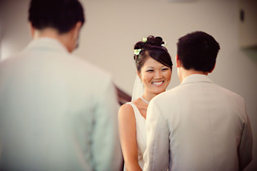 Bride smiling during her wedding ceremony