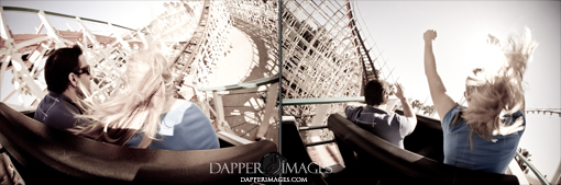 People enjoying a thrilling rollercoaster ride with wind blowing their hair