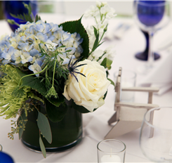 blue hydrangea centerpiece with white roses