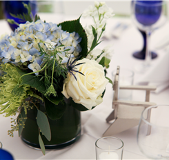 Elegant floral centerpiece with a white rose for a special occasion