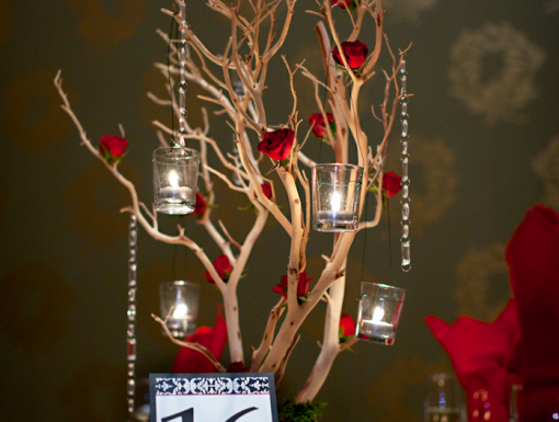 Elegant centerpiece with roses candles and crystals