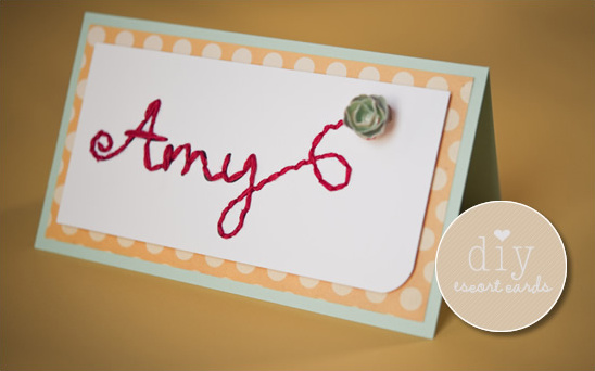 Embroidered Amy escort card with succulent