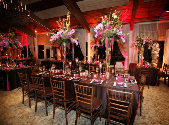 Elegant wedding reception dinner setting with floral centerpieces
