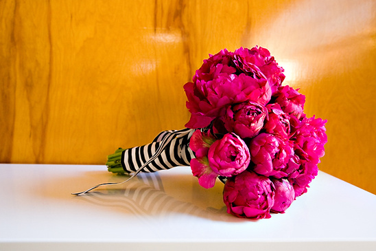 Striking pink peony bouquet with striped ribbon detail