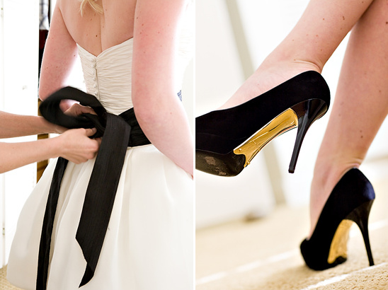 Bride getting ready with black sash and black high heels