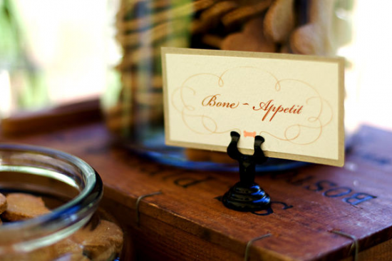 A charming Bone Appetit sign on display with dog biscuits