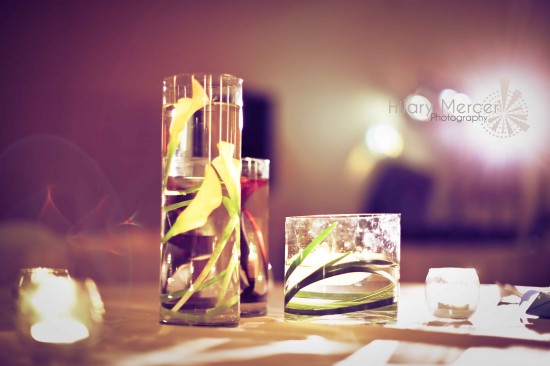 Elegant glass vases with floral decorations on a table