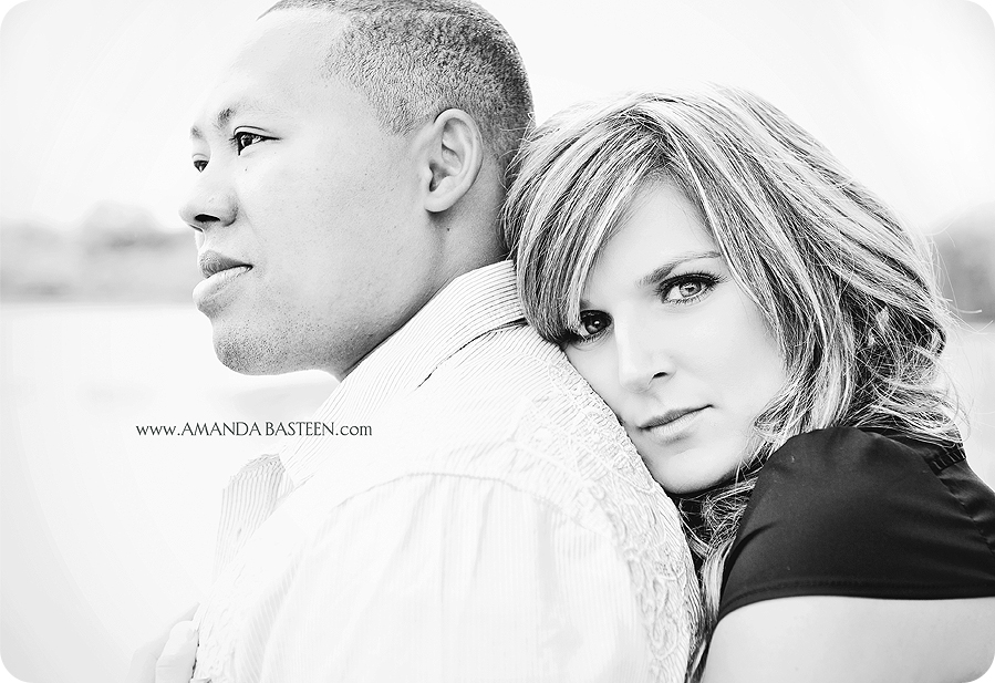 Romantic black and white portrait of a couple in tender embrace