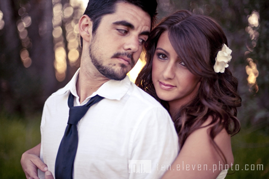 Romantic couple embracing with loving look in natural lighting
