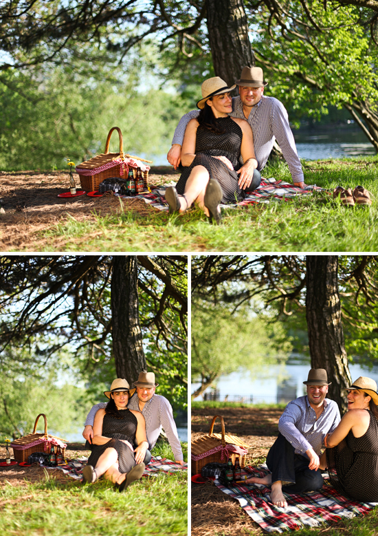 Couple on a picnic under a tree, enjoying a sunny day by a lake