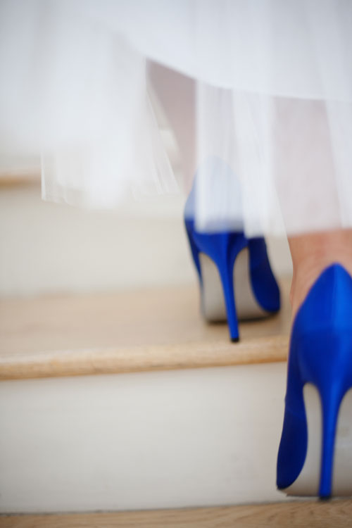 Elegant blue heels on stairs, a woman's fashion style