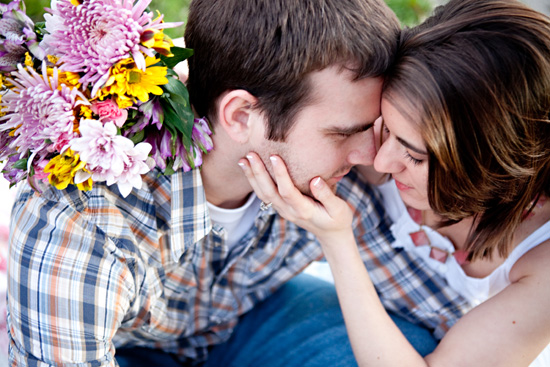 Couple embracing, flowers, showing romantic love, happy
