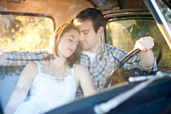 Romantic couple enjoying a peaceful moment together in a classic car