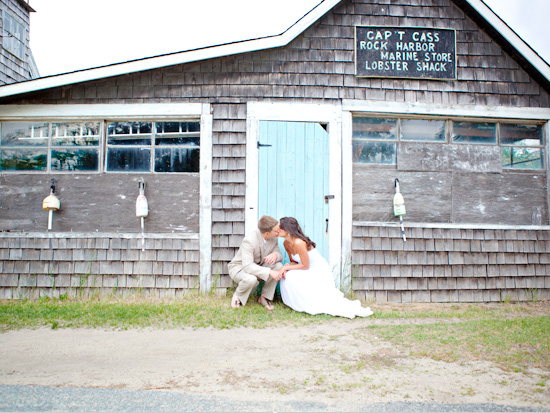Romantic couple kissing near Capt Cass Lobster Shack