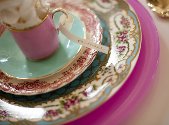 Floral china tea set on pink plates