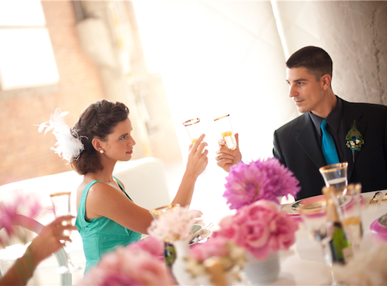 Couple toasting at wedding reception