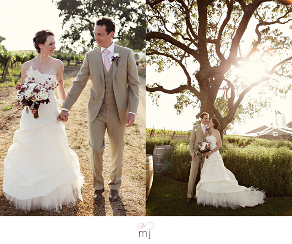 Happy couple posing for wedding photos at vineyard