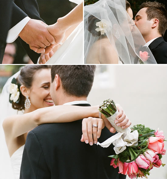 Happy couple kissing and holding hands on wedding day