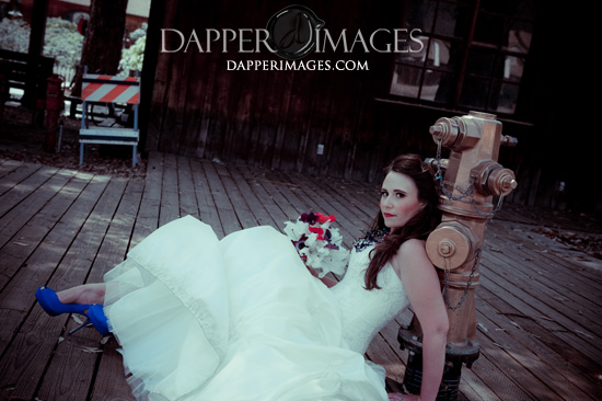 Bride in white dress blue shoes