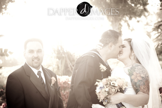Happy couple sharing a tender kiss at their wedding