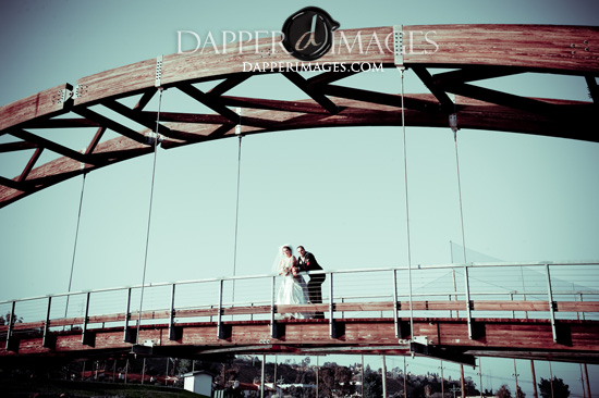 Wooden bridge couple wedding photo