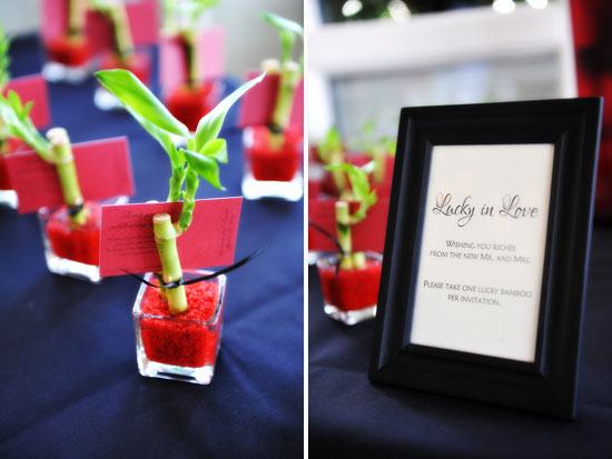 Lucky bamboo wedding favors with Lucky in Love sign displayed