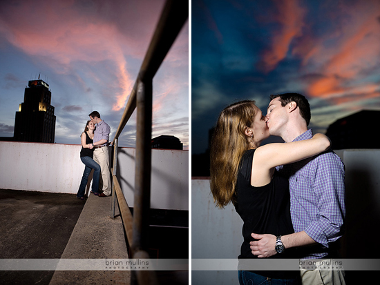 Couple kissing on a rooftop at sunset in urban setting