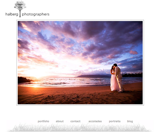 Couple embraces on a beach at sunset by Halberg photographers