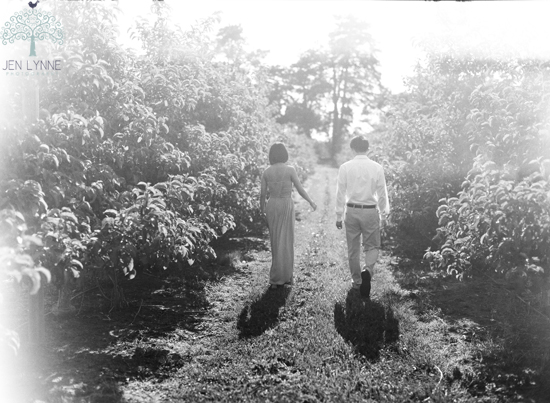 Black and white photo of couple walking away