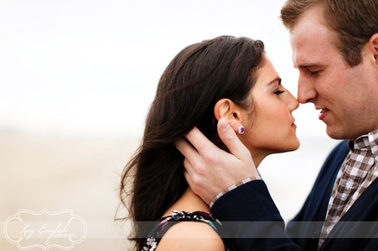 Couple tenderly kissing outdoors