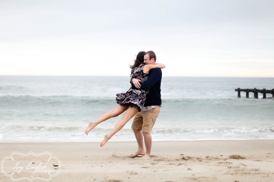 Couple embraces on beach