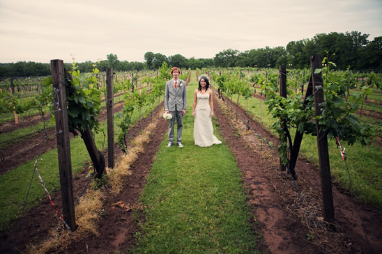 Couple in vineyard wedding attire