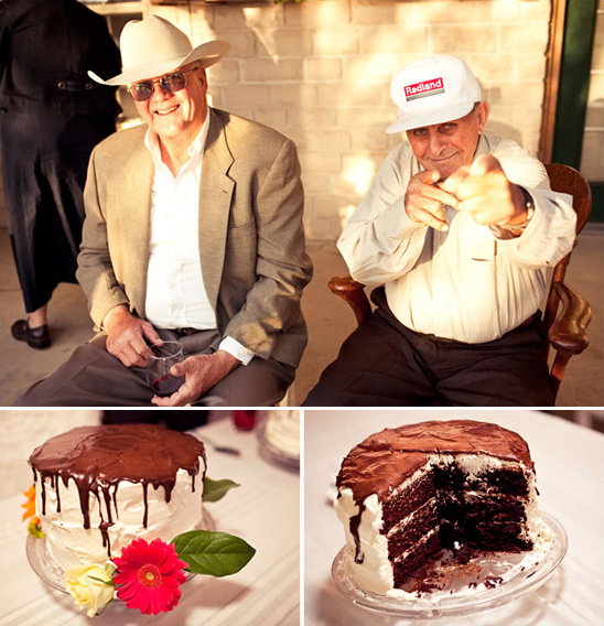 Two smiling men and a delicious chocolate cake