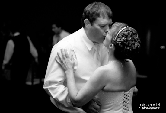 Romantic black and white photo of a couple kissing