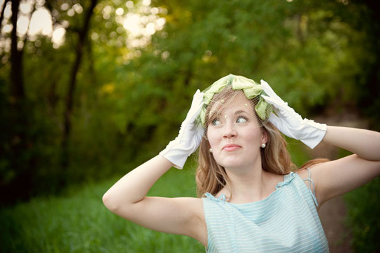 Woman in vintage dress and gloves, a retro summer look