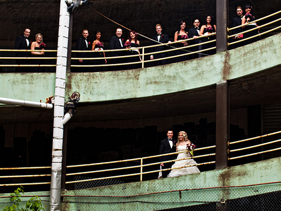 Wedding party in parking garage quirky photoshoot