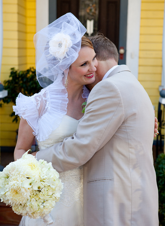 Bride and groom share a loving embrace on their wedding day