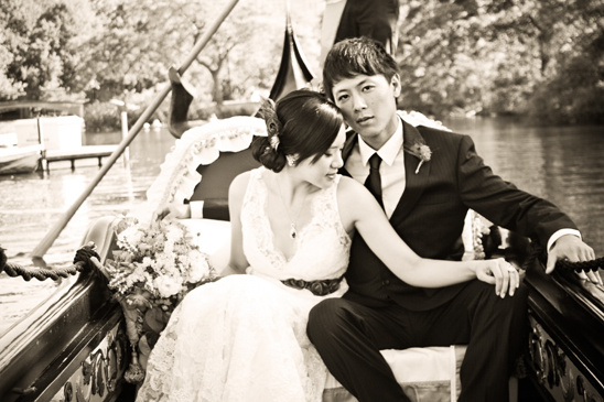 Bride and groom in gondola black and white photo