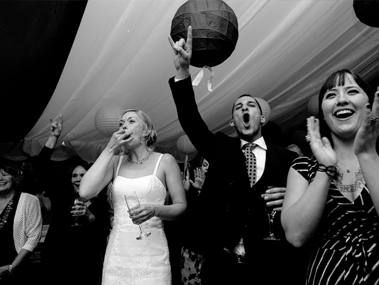 Wedding guests cheering and celebrating