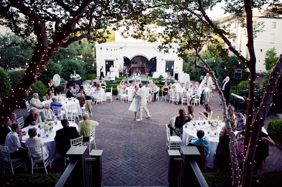 Outdoor wedding reception with dancing and string lights