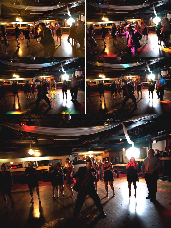 Wedding reception guests dance joyfully at the venue