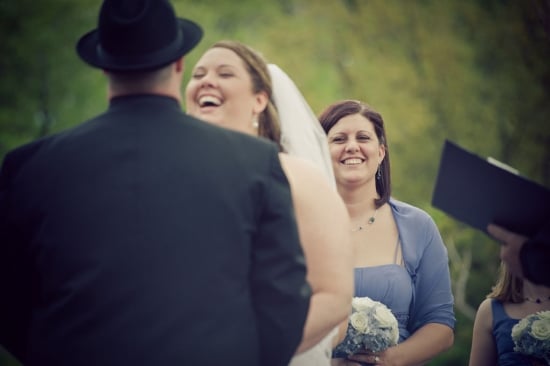 bridesmaid smiling during wedding