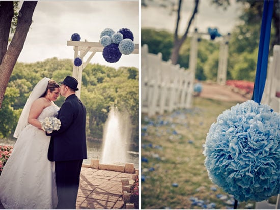 bride and groom kissing at altar decorated in blue