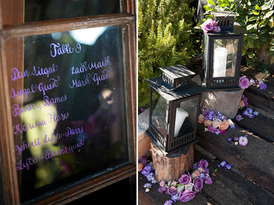Wedding table seating chart with lanterns and flowers