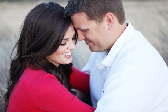 Couple embracing, loving faces close