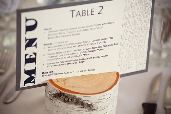 Table 2 wedding menu on birch wood stand