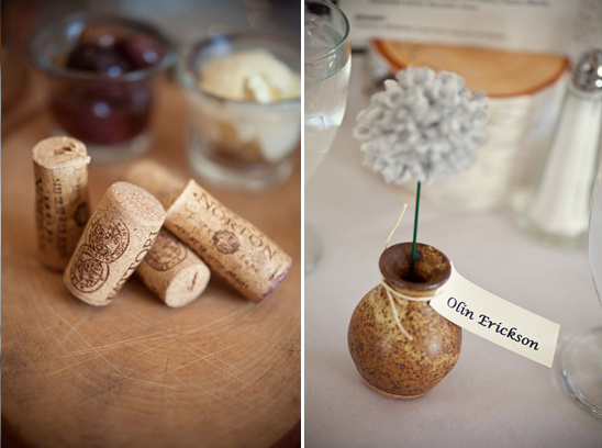 Wine cork place card holders with a small flower