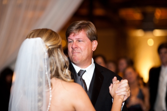 Father and daughter share a heartfelt dance at a wedding reception